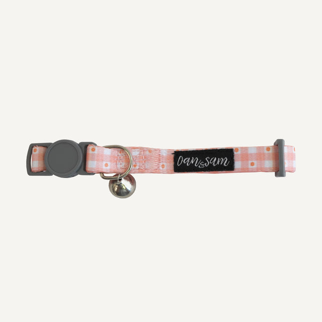 Dan & Sam Daisy Picnic cat collar by Macaw And Friends, featuring a colorful floral design for pet care and cat accessories.