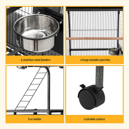 Large black Macaw and Friends bird cage with stand, wheels, and spacious design for parrots and budgies.