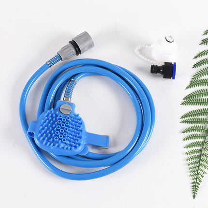 Blue 2-in-1 pet bathing tool and massager by Macaw And Friends, handheld silicone shower sprayer with hose and tap adapters for dogs and cats.