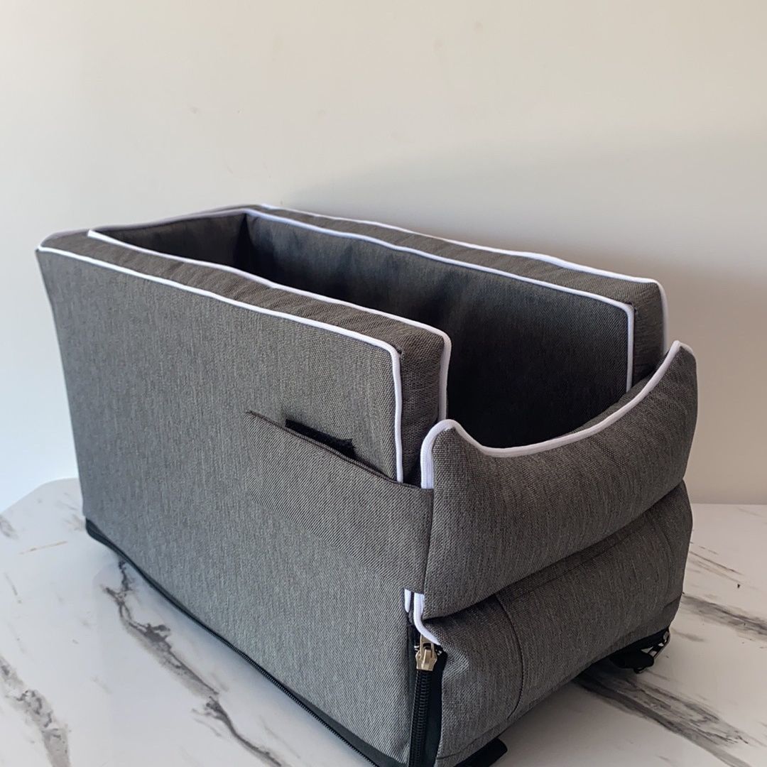 Macaw and Friends thickened pet car seat for dogs and cats with removable cooling mat, handle, and center console design.