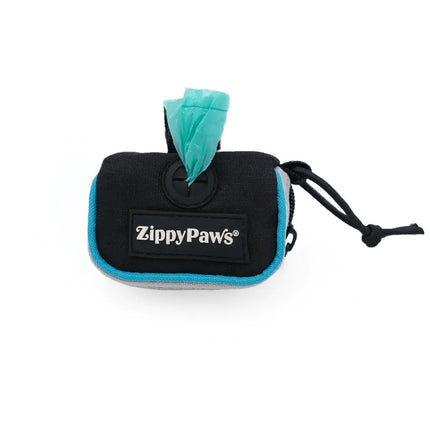 Green Zippy Paws Adventure Leash with dog poop bag dispenser and bonus roll by Macaw And Friends, attached to a dog leash.