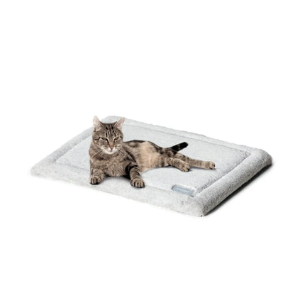Self-warming cat mat by Macaw And Friends, soft pet bed with thermal lining for cozy comfort for cats.